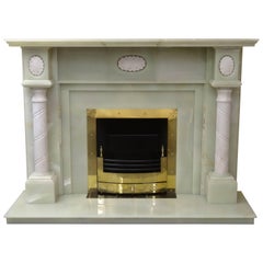 Green Onyx and Carved Marble Fireplace with Brass Frame and Fire Basket