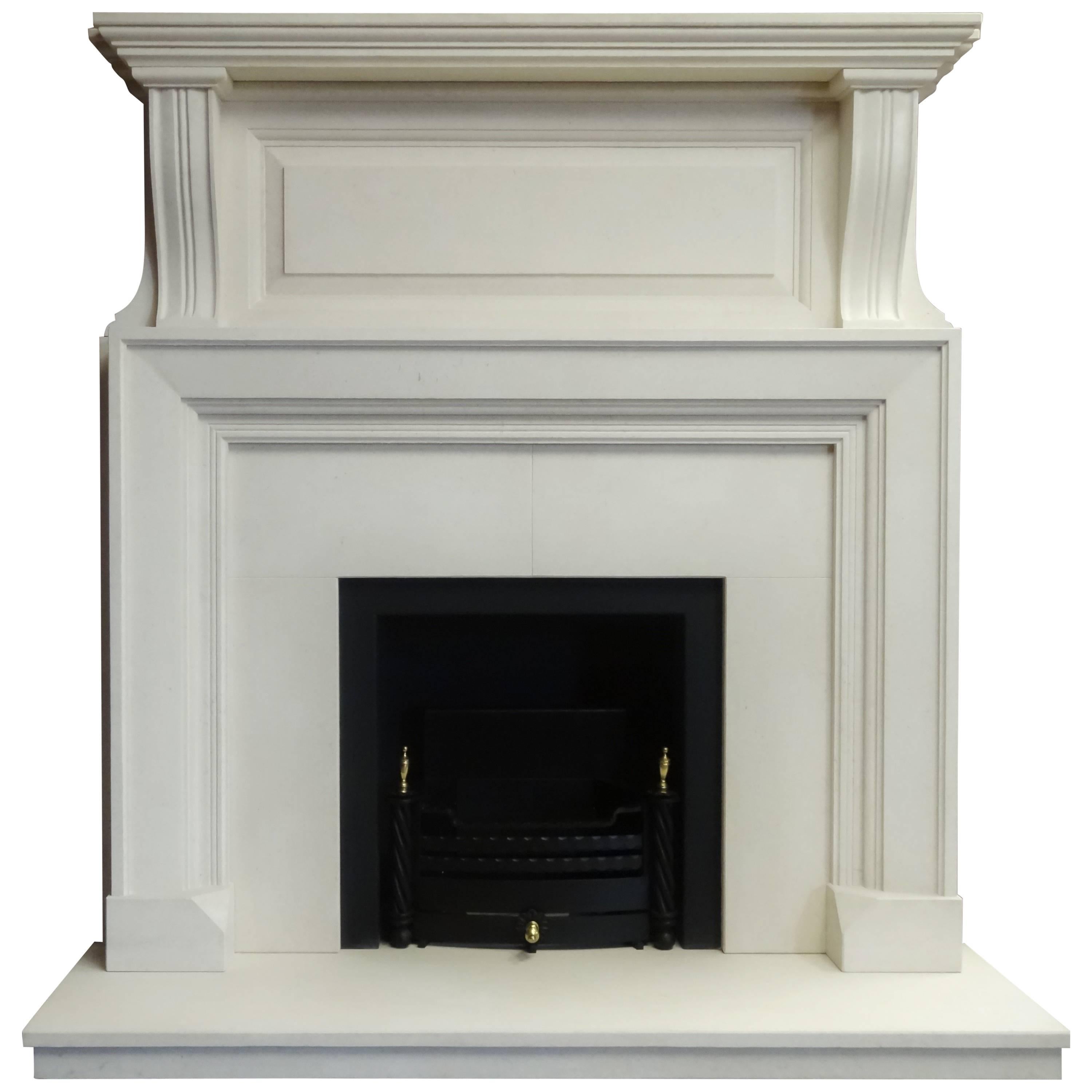 Irish Edwardian Style Limestone Fireplace with Black Metal Frame and Fire Basket For Sale