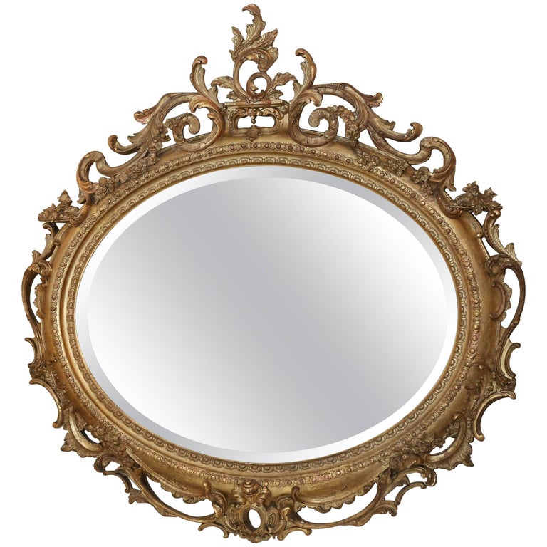 Pair of Louis Philippe Giltwood Oval Mirrors, 19th Century Rococo Revival Taste For Sale at 1stdibs