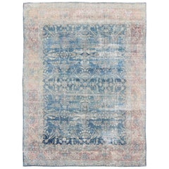 Antiker persischer Kerman-Teppich mit Paisley- und Blumenmotiven in Blau und Rosa