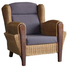 Danish Mid-Century Wicker Lounge Chair with Magazine Pockets