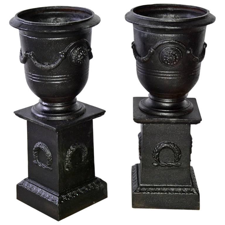 Pair of Vintage Neoclassical Style Urns on Pedestals