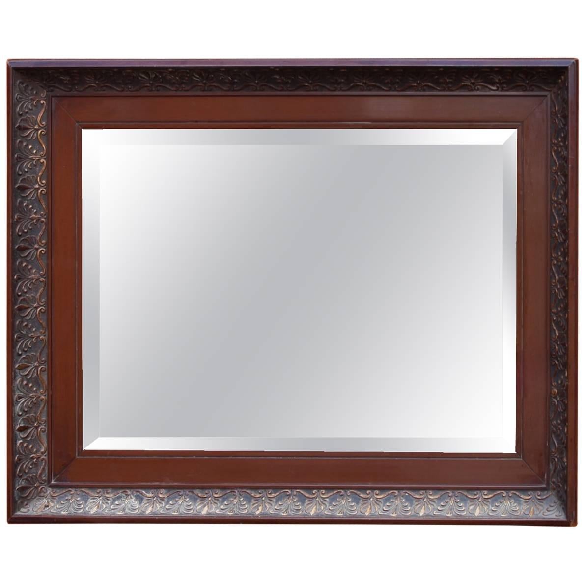 Mirror in Polished Mahogany and Faceted from circa 1920s