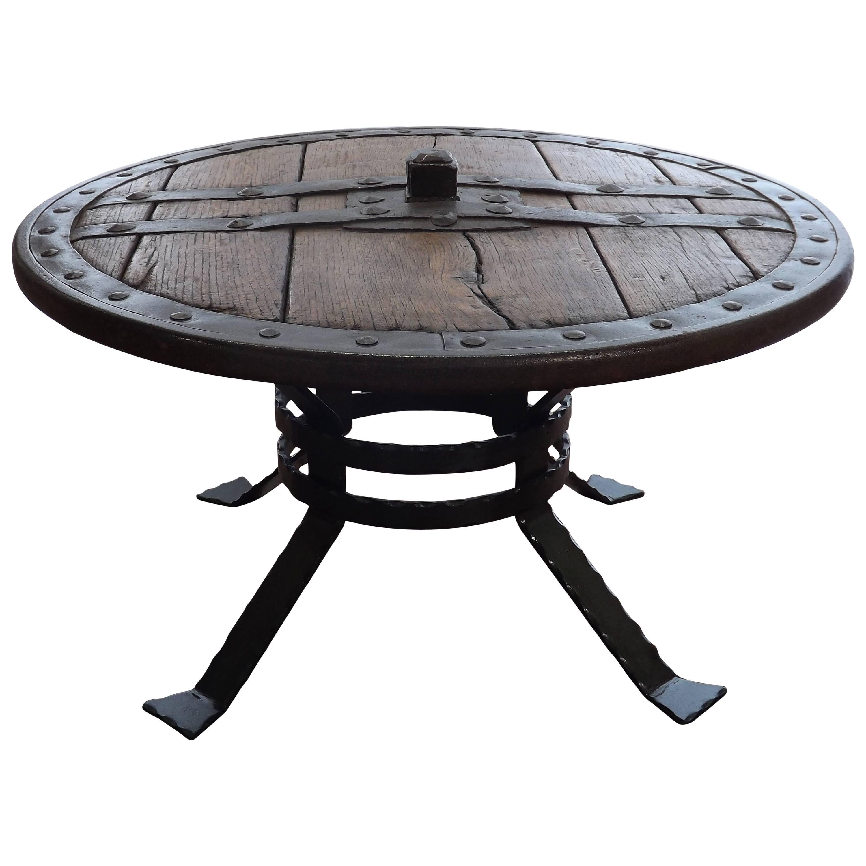 Medieval Forged Iron and Hardwood Wagon or Chariot Wheel Coffee Table For Sale