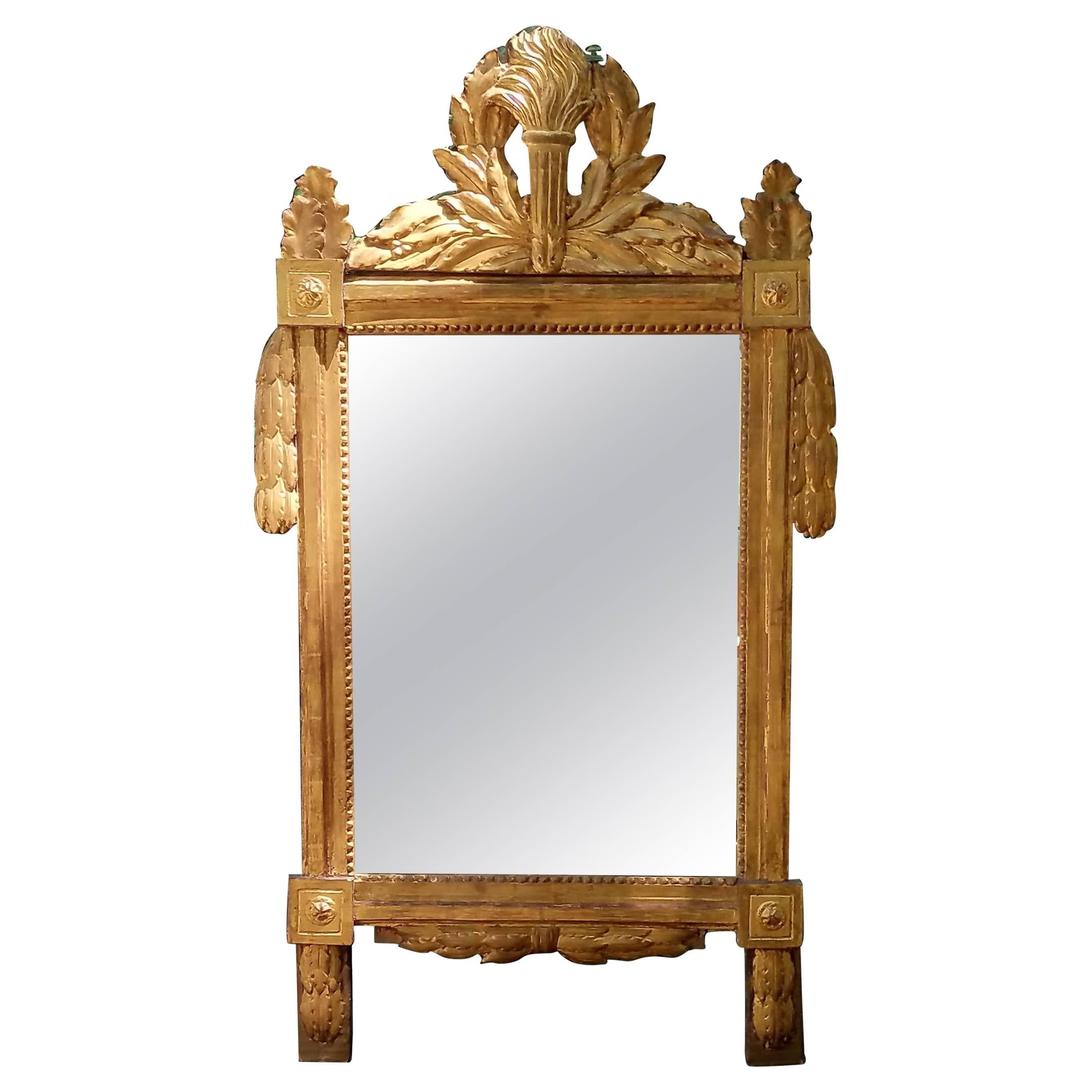 Beautiful 18th Century Carved French Gilt Mirror with Flaming Torch and Laurel For Sale