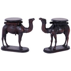Two Similar Anglo-Indian Carved Mahogany Camels
