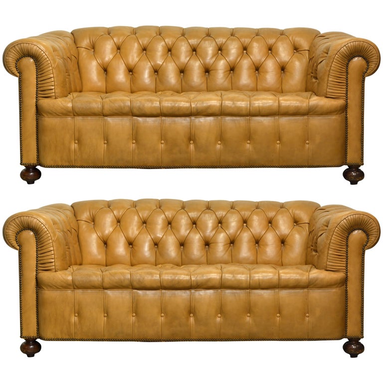 Pair of Vintage Leather Chesterfield Sofas with Rolled Arms and