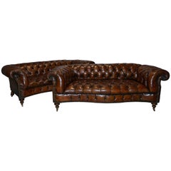 Used Pair of Fully Restored Howard & Son's Style Victorian Chesterfield Leather Sofas