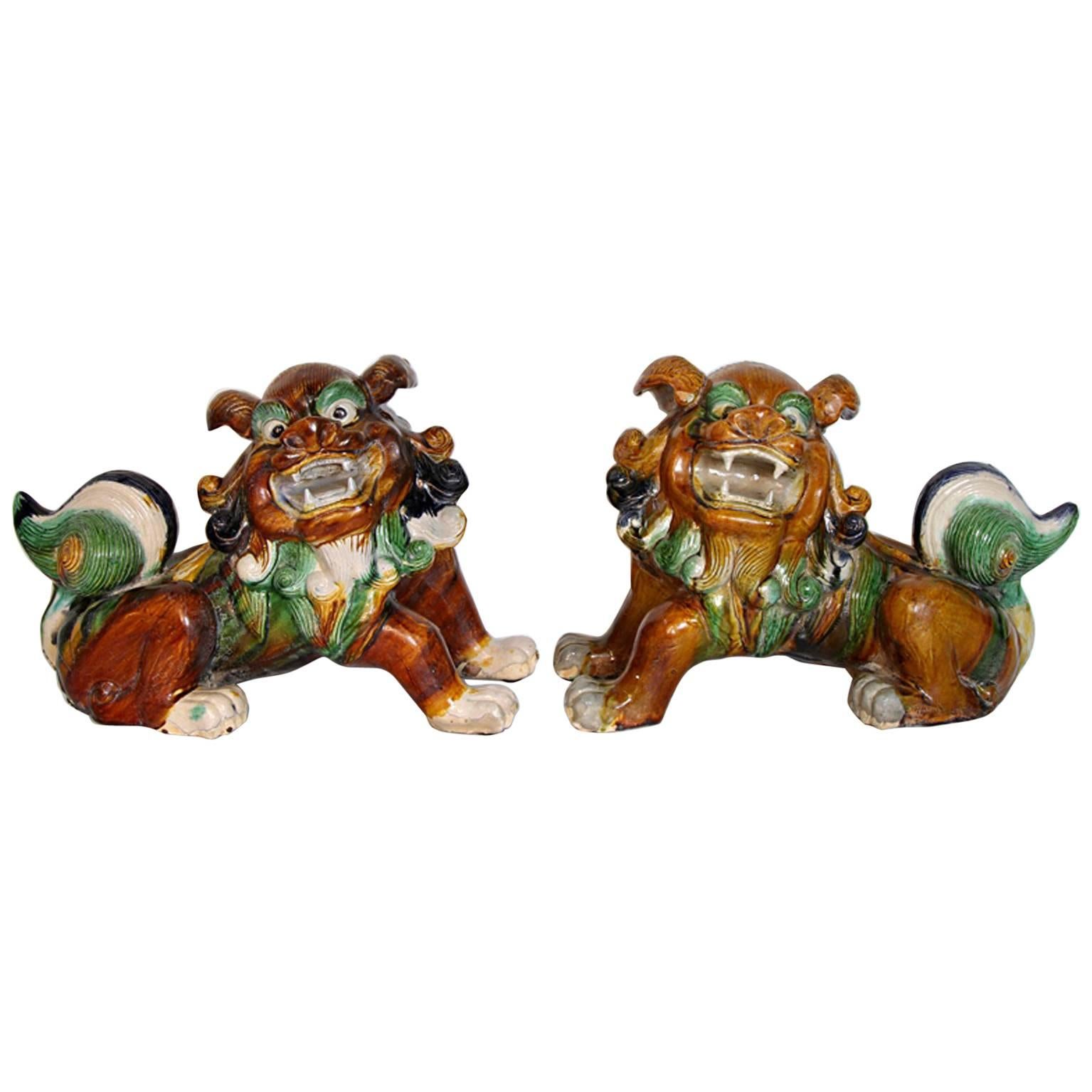 Pair of Mid-Century Sancai Glazed Foo Dogs For Sale