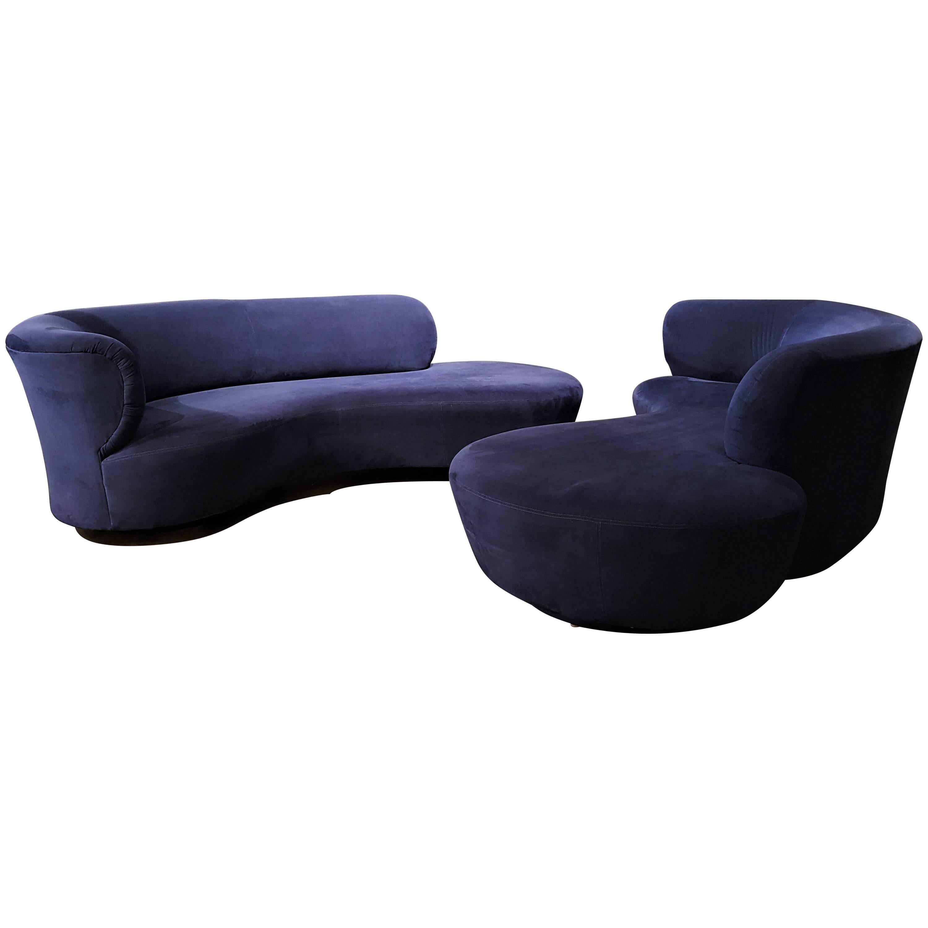 Iconic serpentine or cloud sofa Model 4891JL by Vladmir Kagan for Directional Furniture. This sofa was reupholstered several years ago in a gorgeous dark blue ultra suede which is in excellent condition. Extremely comfortable and ready to go!
If