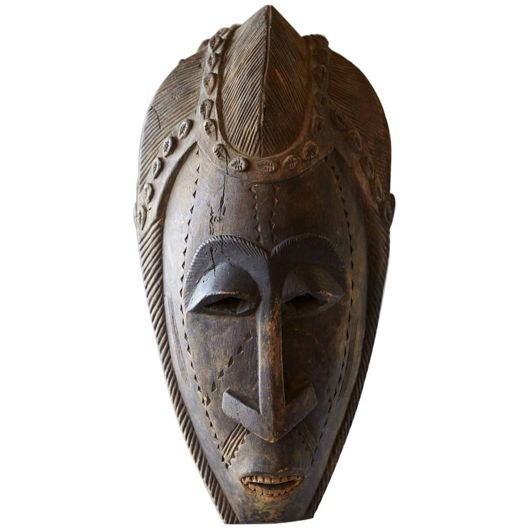 Decorative African Hand-Carved Wood Mask, circa 1960s