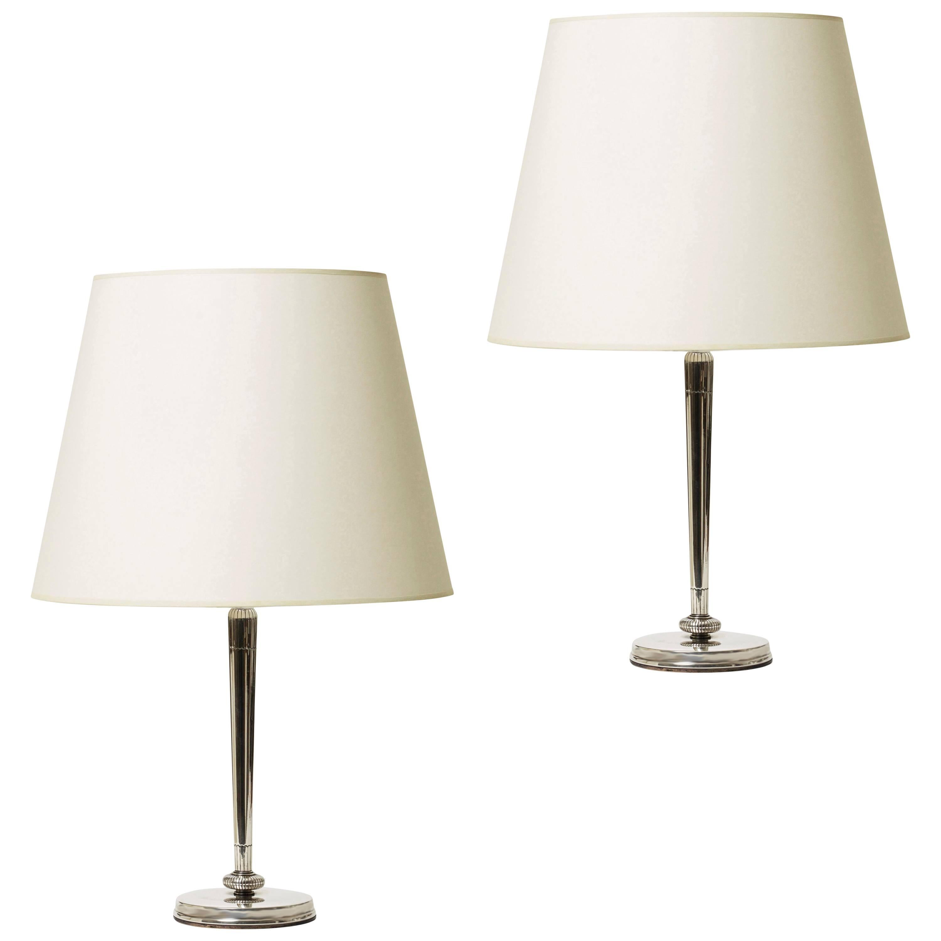 Pair of Tailored Art Deco Lamps in Silver by Carl Gustav Hallberg For Sale