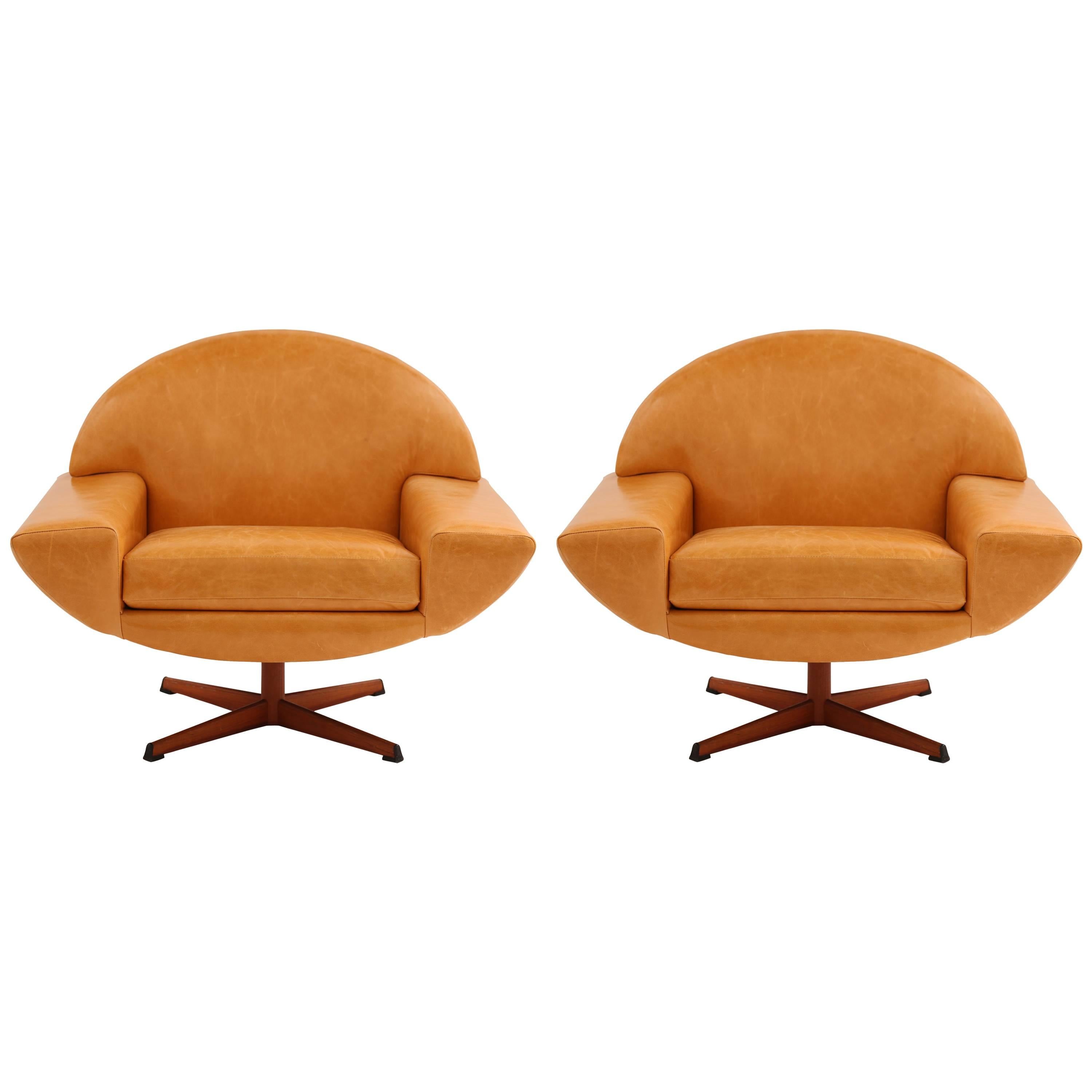 Pair of Johannes Andersen Leather Capri Swivel Lounge Chairs