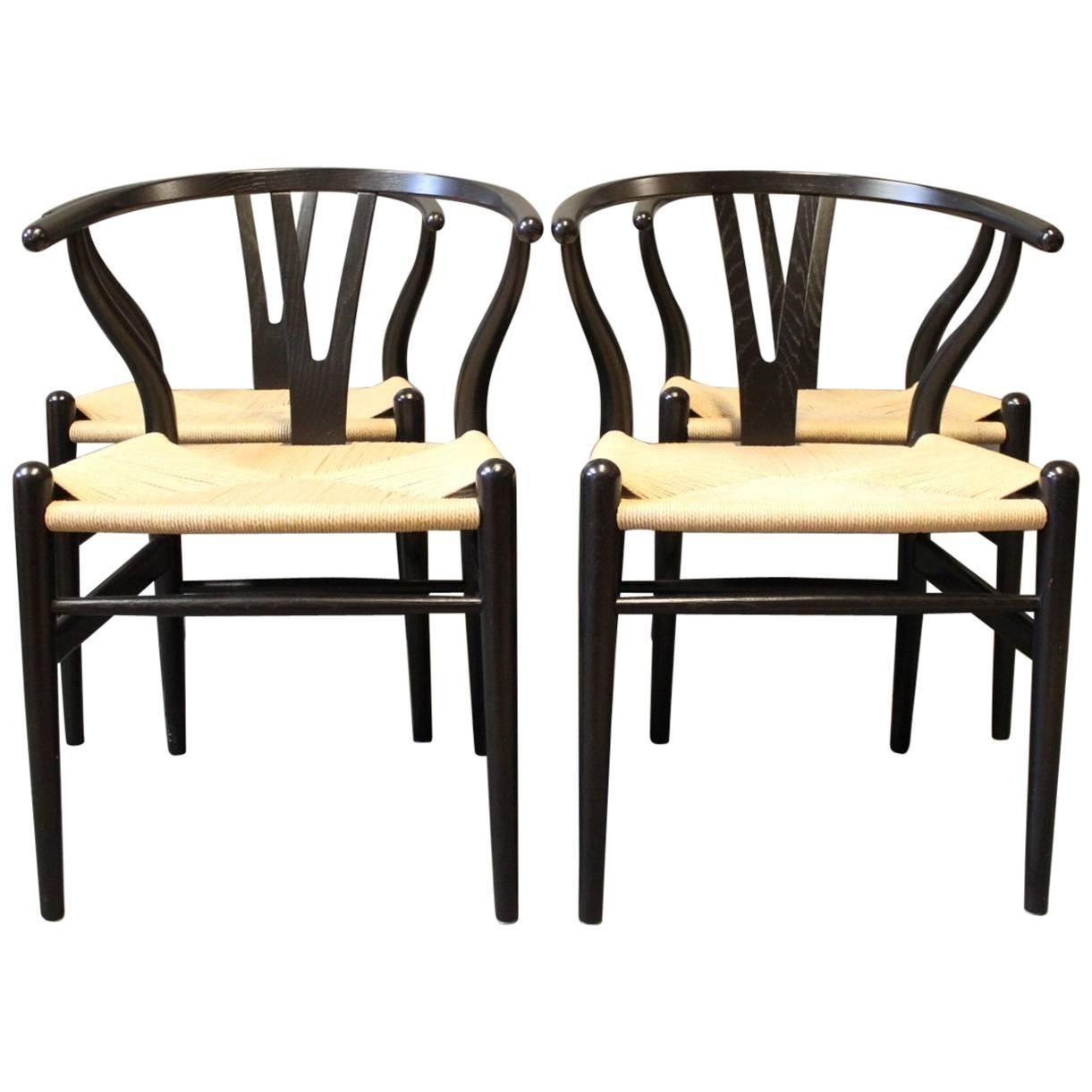 Four Y-Chairs 'Wishbone, ' Model CH24 by Hans J. Wegner and Carl Hansen & Son