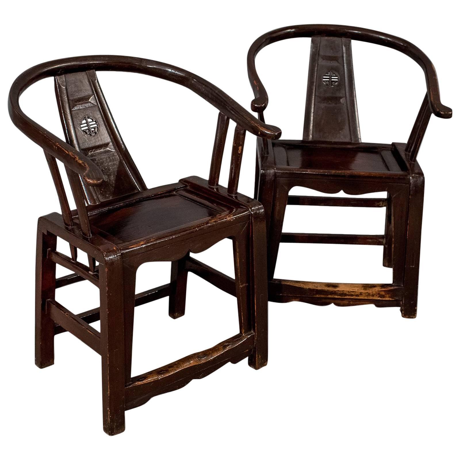 Pair of Chinese Oriental Asian Carver Elbow Horseshoe Armchairs, circa 1890