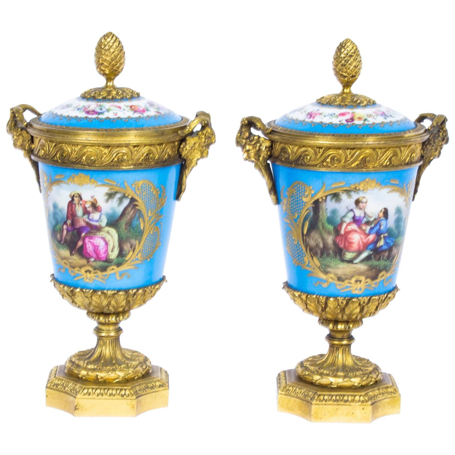 19th Century Pair of French Ormolu-Mounted Sèvres Lidded Urns Vases