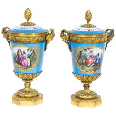 19th Century Pair of French Ormolu-Mounted Sèvres Lidded Urns Vases