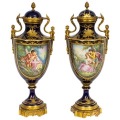 Early 20th Century Pair of Ormolu-Mounted Sevres Style Lidded Urns Vases