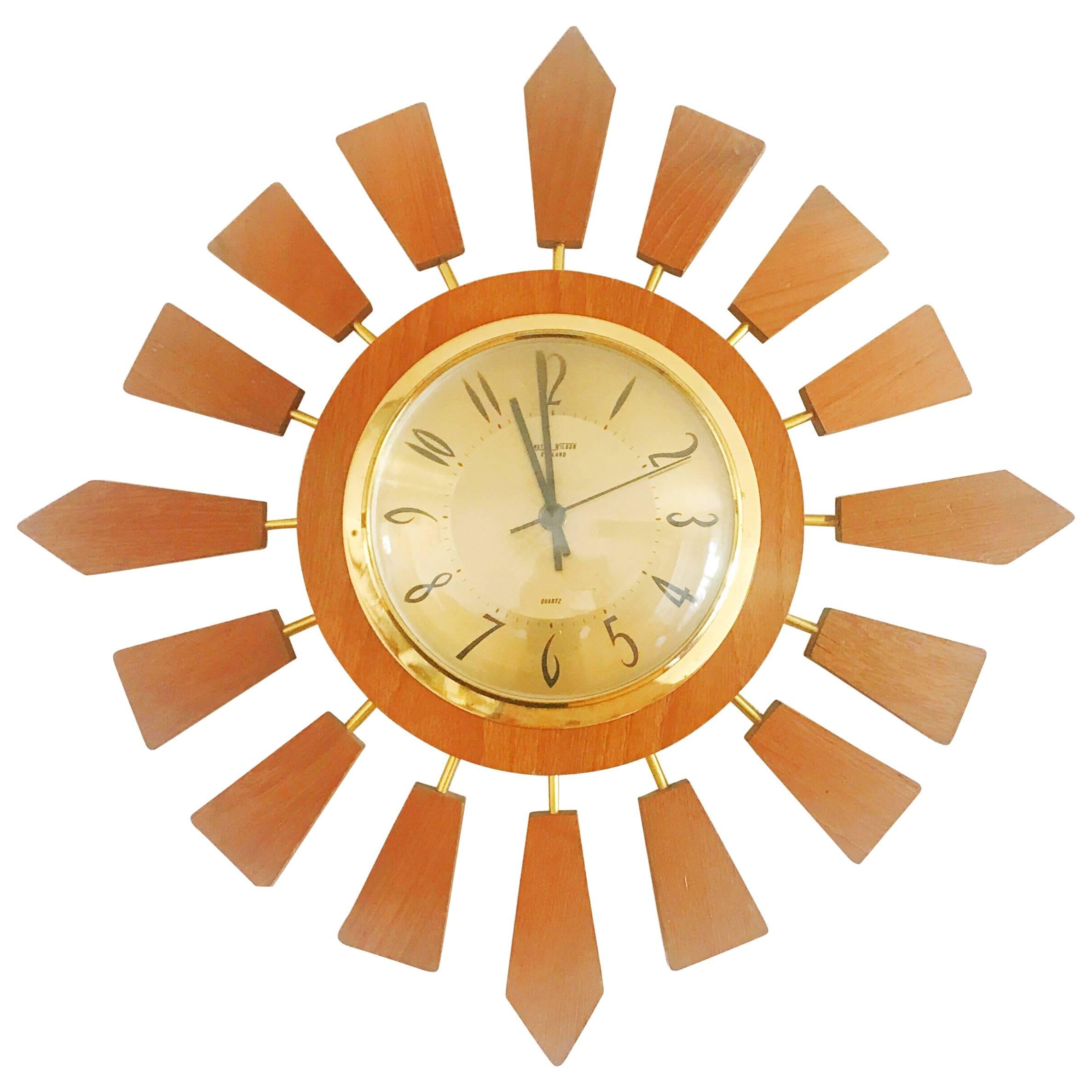 Anstey Wilson England Brass and Teak Sunburst Clock, circa 1950, England