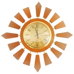 Vintage Anstey Wilson England Brass and Teak Sunburst Clock, circa 1950, England