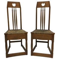 Shapland and Petter, a Pair of Ash Side Chairs in the Style of M H Baillie Scott