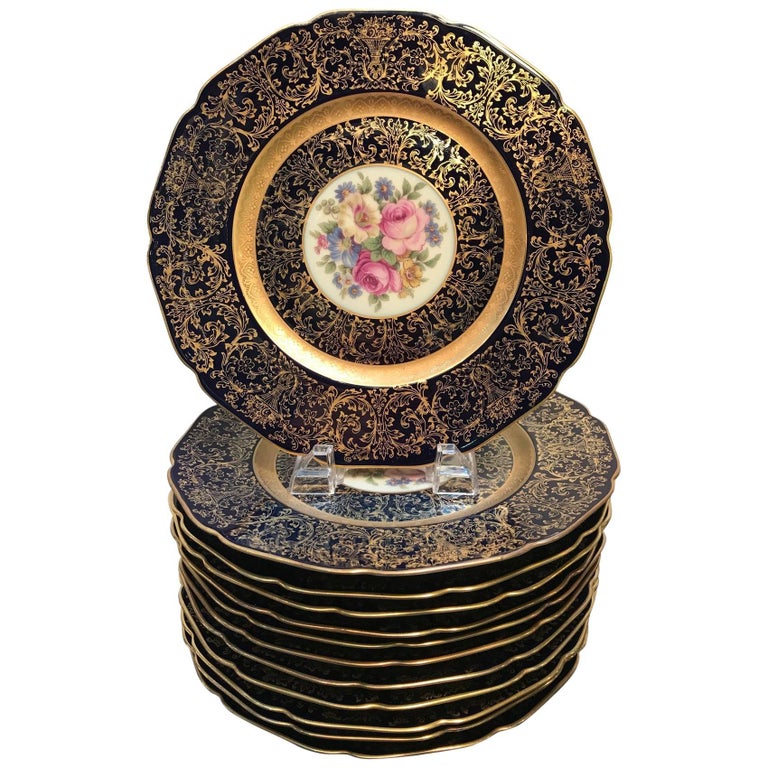 Elaborate Set of 12 Cobalt and Gilt Floral Service Plates For Sale at
