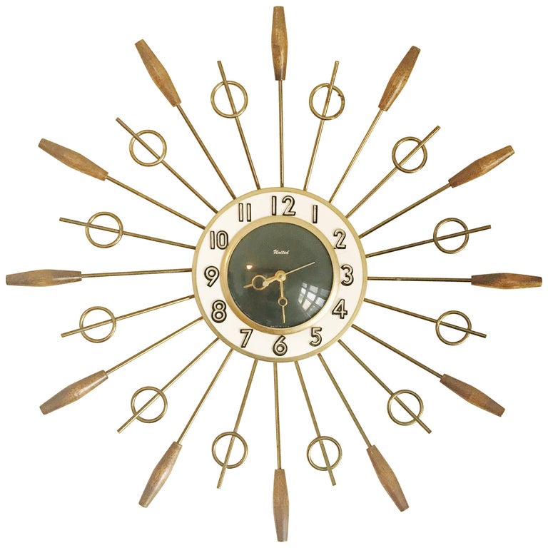 United Brass Spindles Sunburst Clock, circa 1950 For Sale