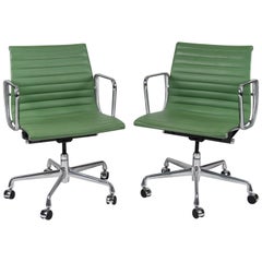 Pair of Eames for Herman Miller Aluminum Group Chairs in Apple Green Leather