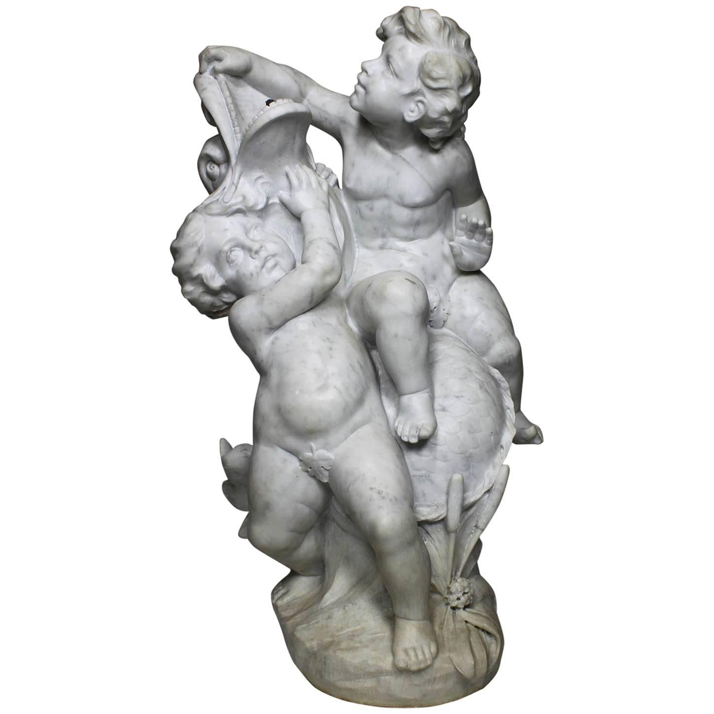 A French 19th-20th Century Carved White Marble Fountain Sculpture with Children For Sale