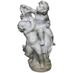 Sculpture de fontaine en marbre blanc sculpté avec des enfants, datant du 19e au 20e siècle.