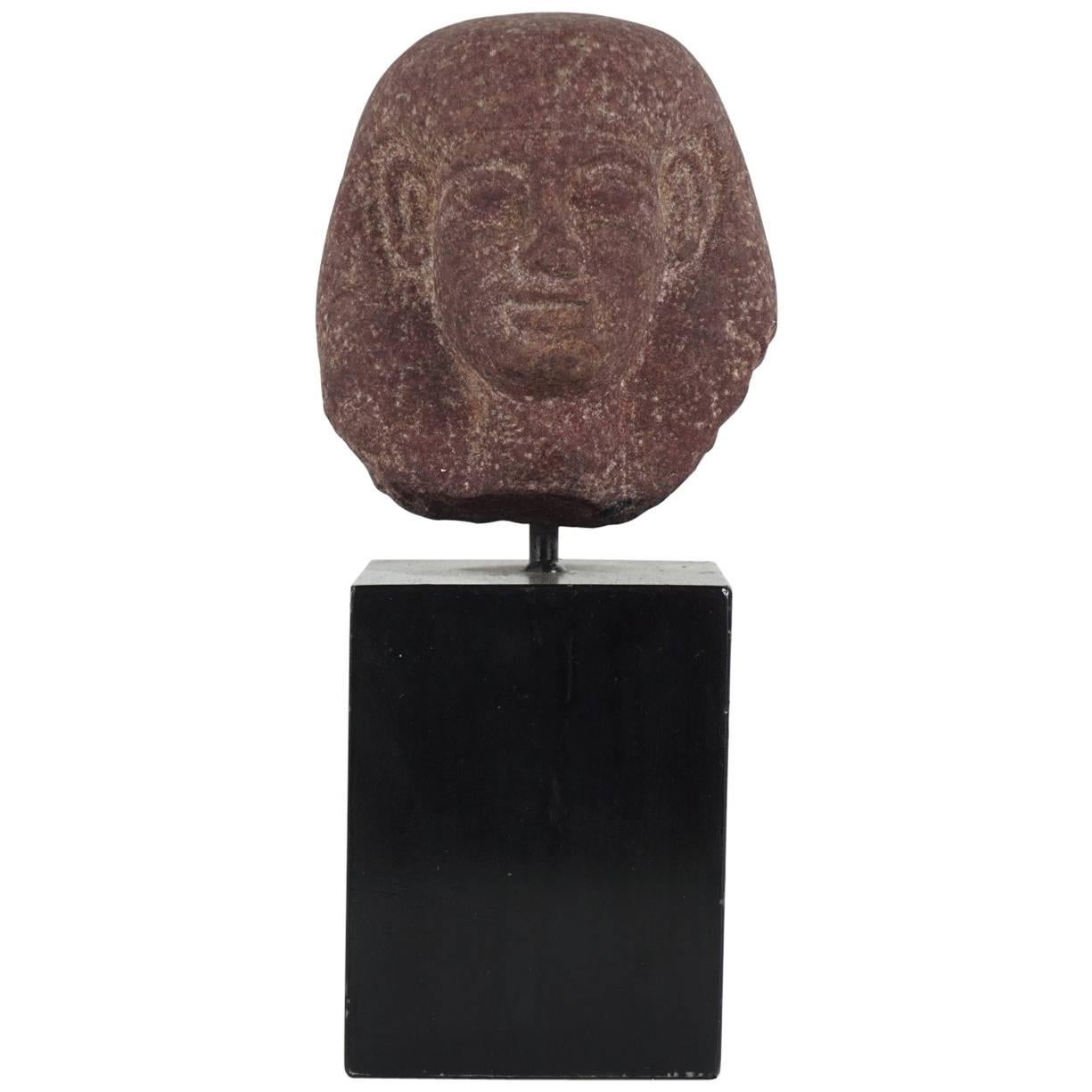 Egyptian Carved Red Granite Head of a Pharaoh Ptolemaic Period Form at