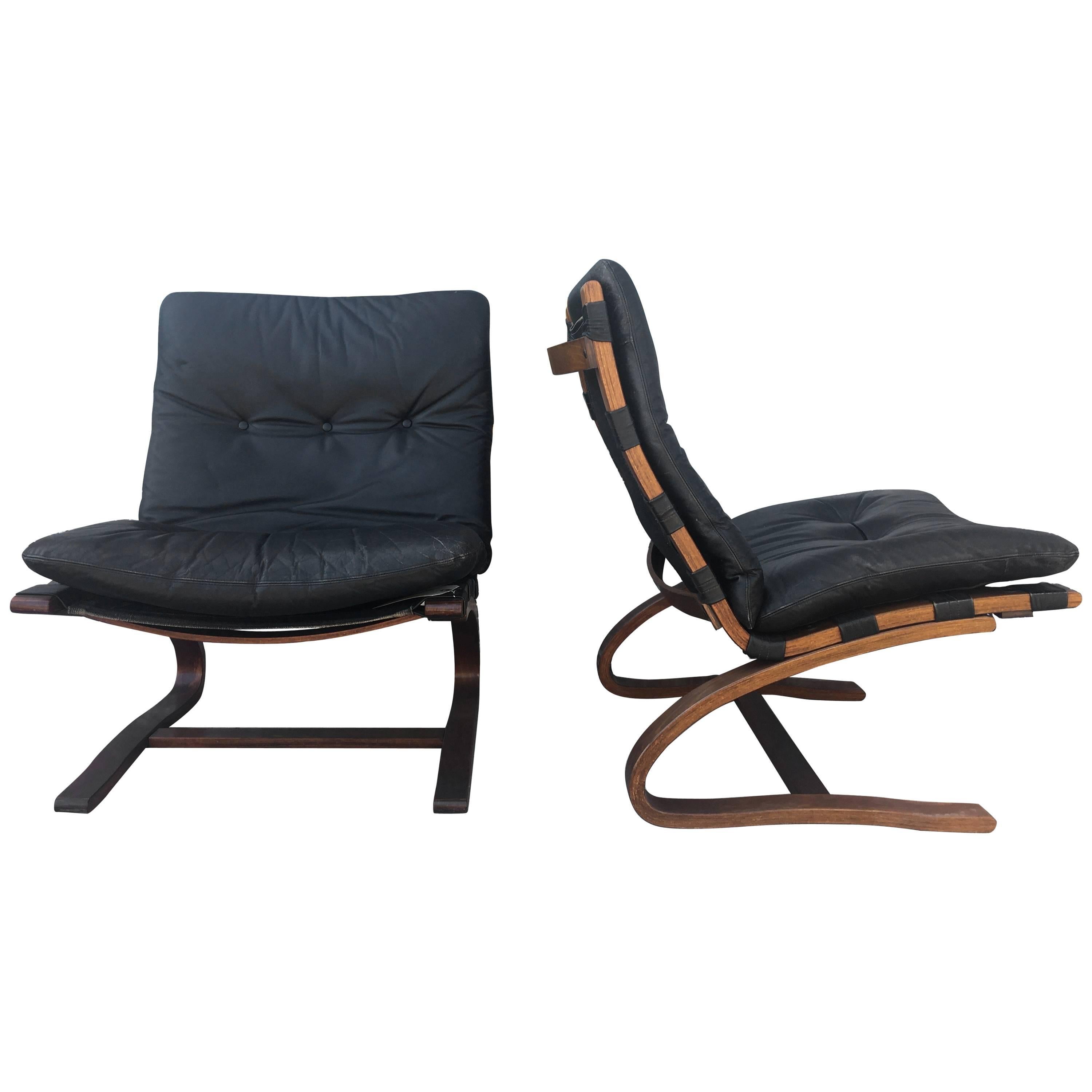 Pair of Black Danish Leather Lounge Chairs