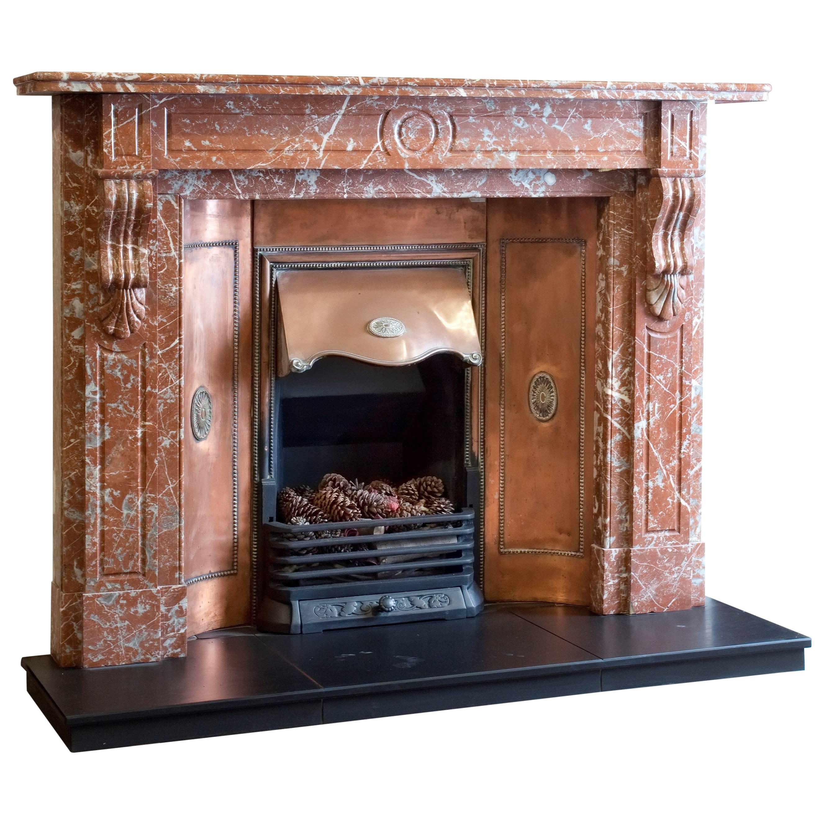 19th Century, Victorian Carved Breche Marble Fireplace with Curved Copper Insert For Sale
