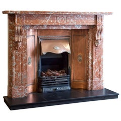 19th Century, Victorian Carved Breche Marble Fireplace with Curved Copper Insert