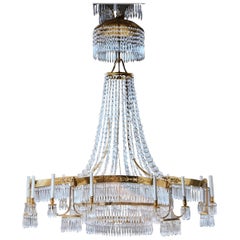 Large Baltic Neoclassical Gilt Bronze and Crystal Twelve-Light Chandelier
