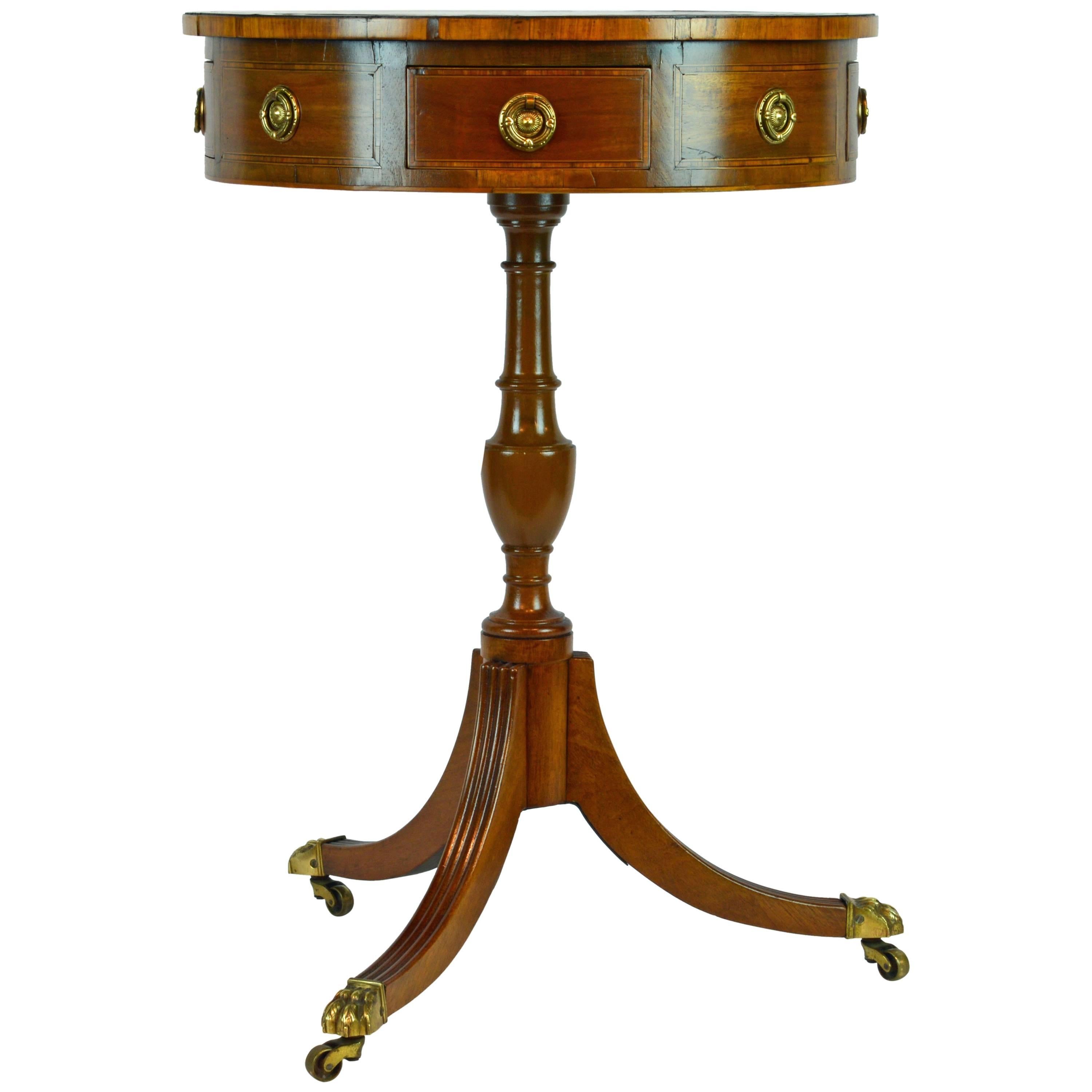Petite English Regency Style Four-Drawer Leather Top Drum Occasional Table