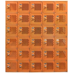 Industrial Locker Set in Orange with Numbered Cubbies and Lockable Pulls