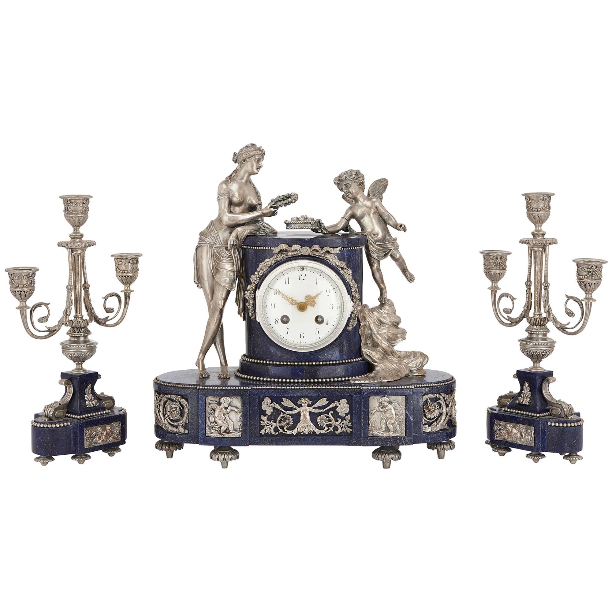Antique French Lapis Lazuli and Silvered Bronze Three-Piece Clock Set