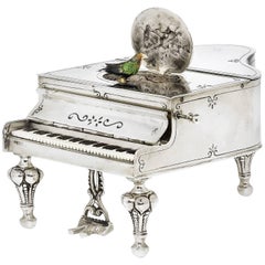 Boîte à musique allemande d'antiquités en argent en forme de grand piano