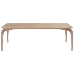 Contemporary bespoke ash dining table. hand shaped legs by Jonathan Field.