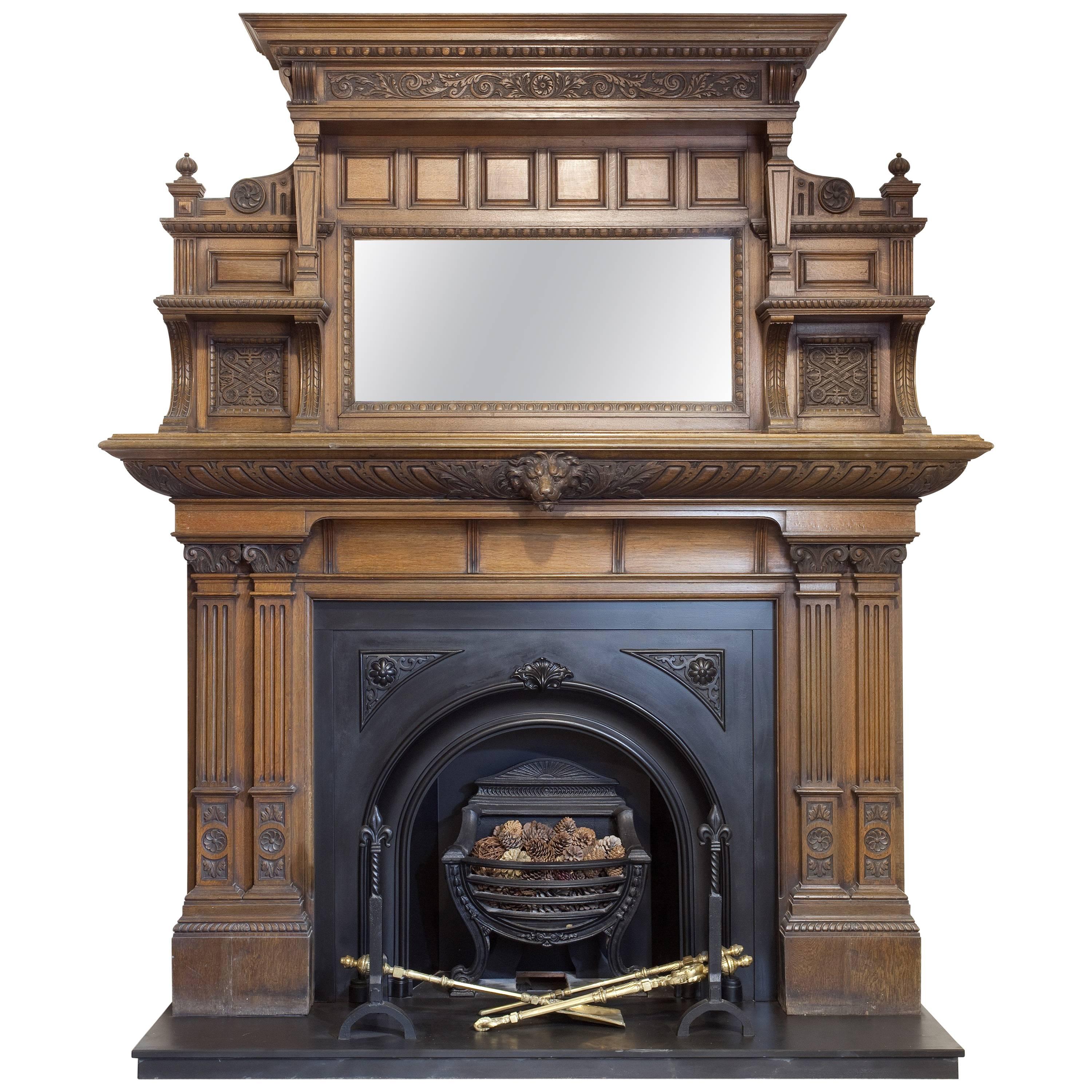 19th Century Victorian Carved Oak Fire Surround with Arched Cast Iron Insert For Sale