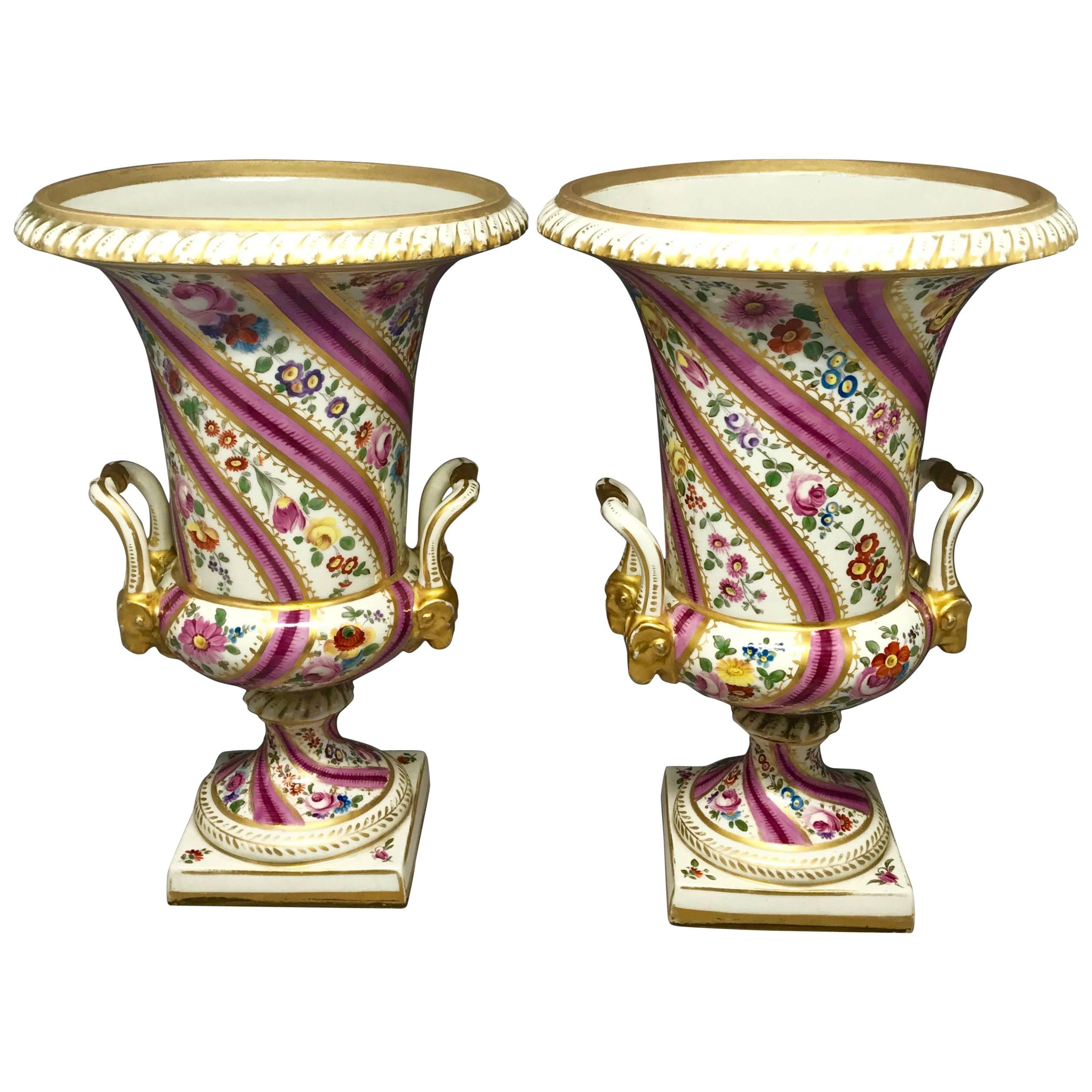 Pair Pink Floral and Gilt Porcelain Painted Urns