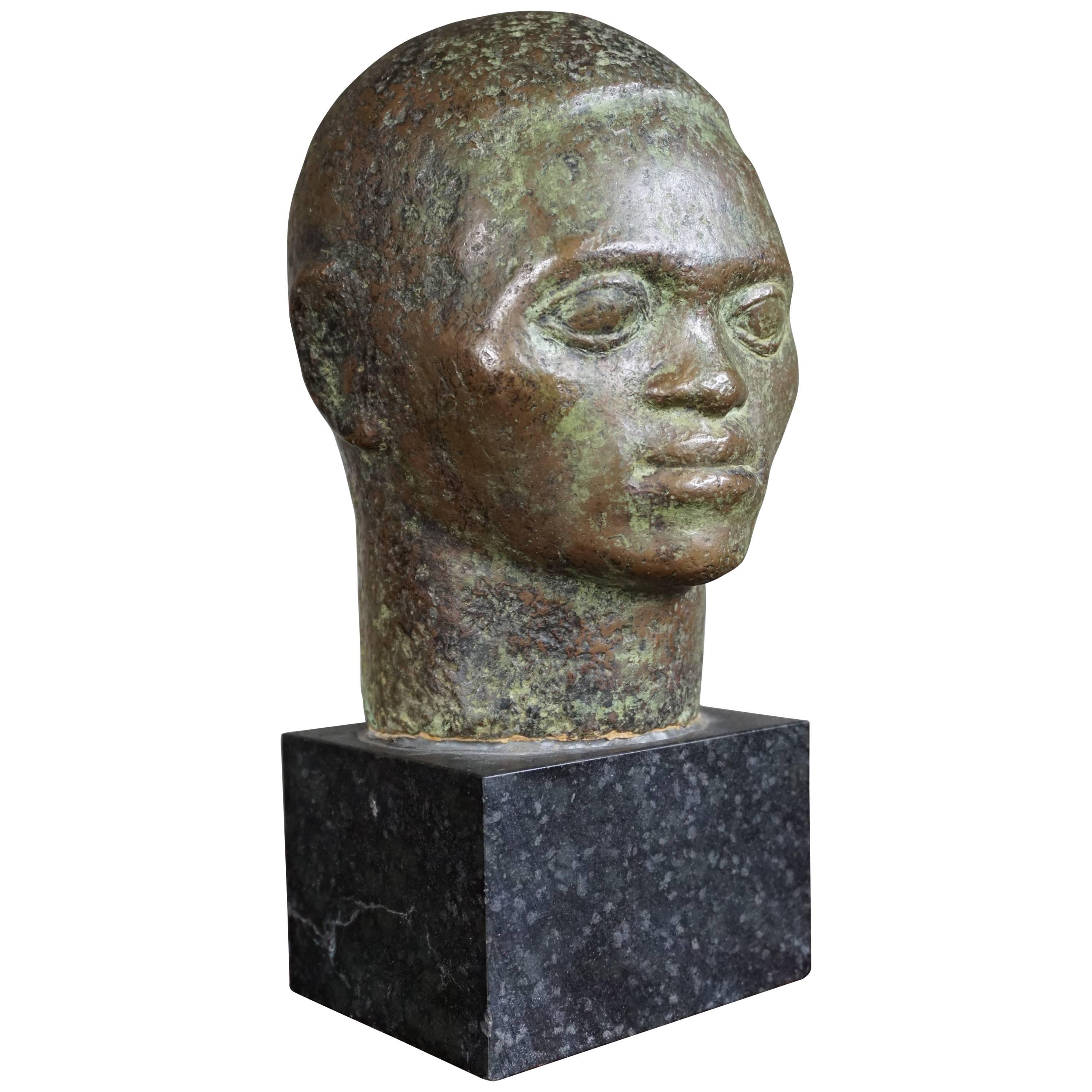 Small to Mid Size, Rare and Serene African Male Bronze Bust on Black Marble Base
