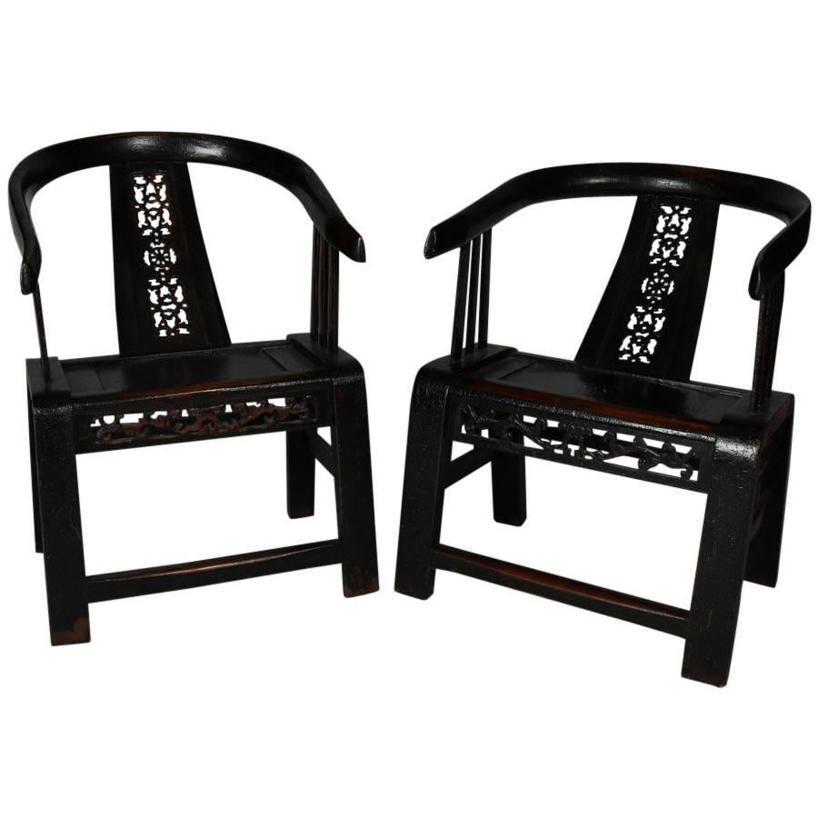 Pair of Chinese Carved and Ebonized Side Chairs with Pierced Slat Back