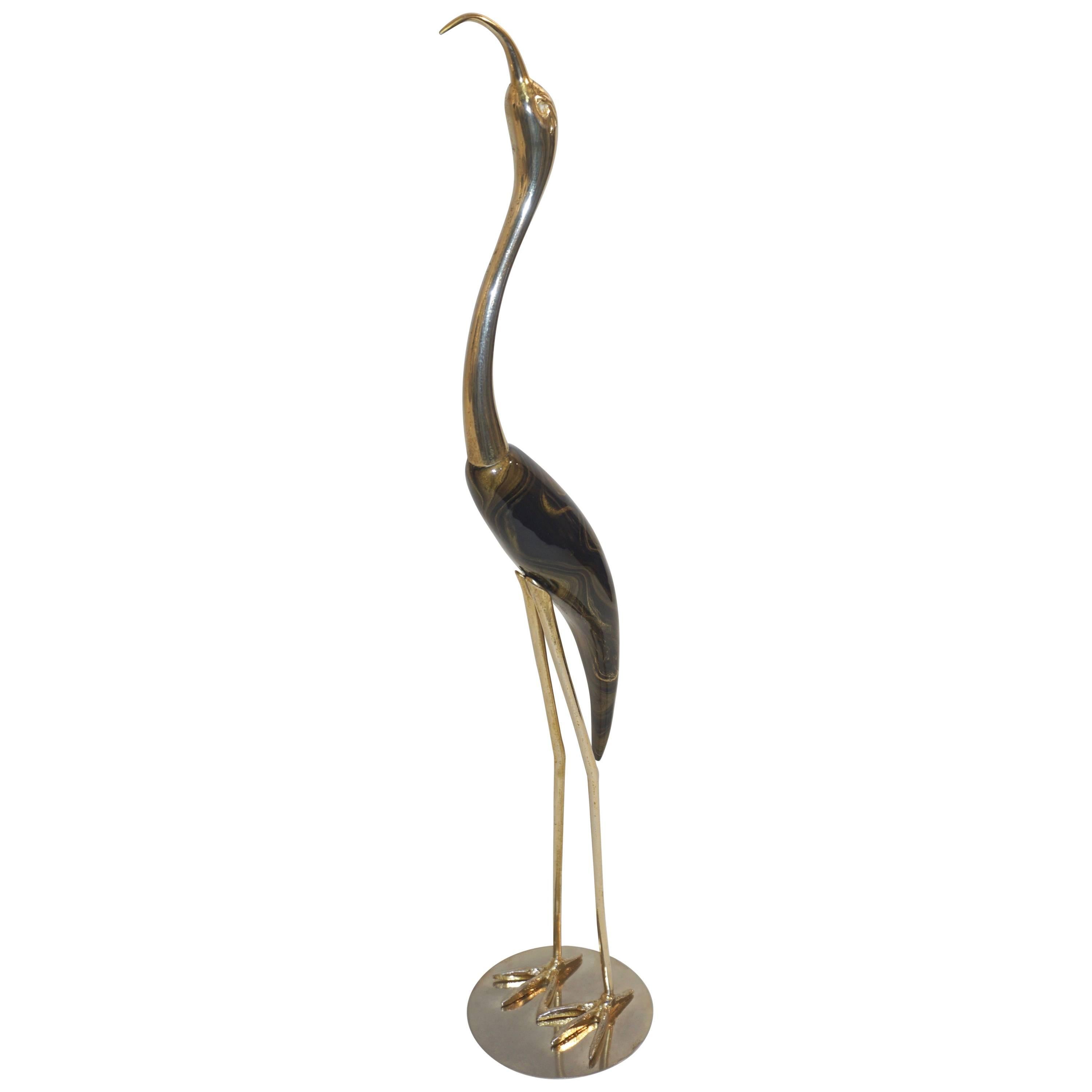 1960s Italian organic sculpture, modern brass bird by Antonio Pavia with a hand-carved wood body decorated and hand enameled in trompe-l'oeil to make it resemble brown marble with golden veins. 
Base dimensions: 4 in x 4 in
Can be complemented by