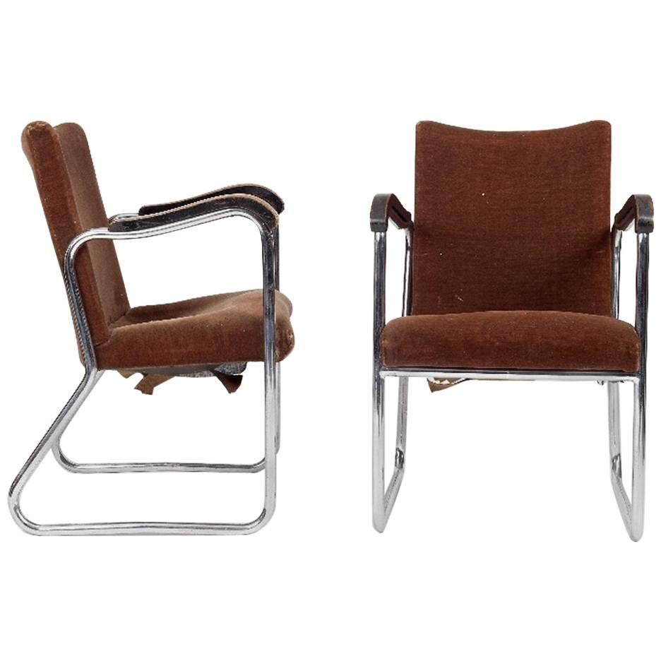 Thonet, a Pair of 1930s Tubular Steel Armchairs with Ebonized Armrests For Sale