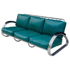 Recently upholstered KEM Weber for Lloyd Art Deco Machine Age Chrome Sofa