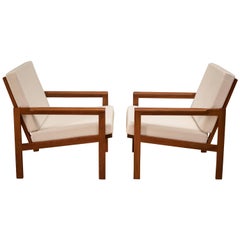 Pair of Danish Teak Lounge Chairs by Illum Wikkelso