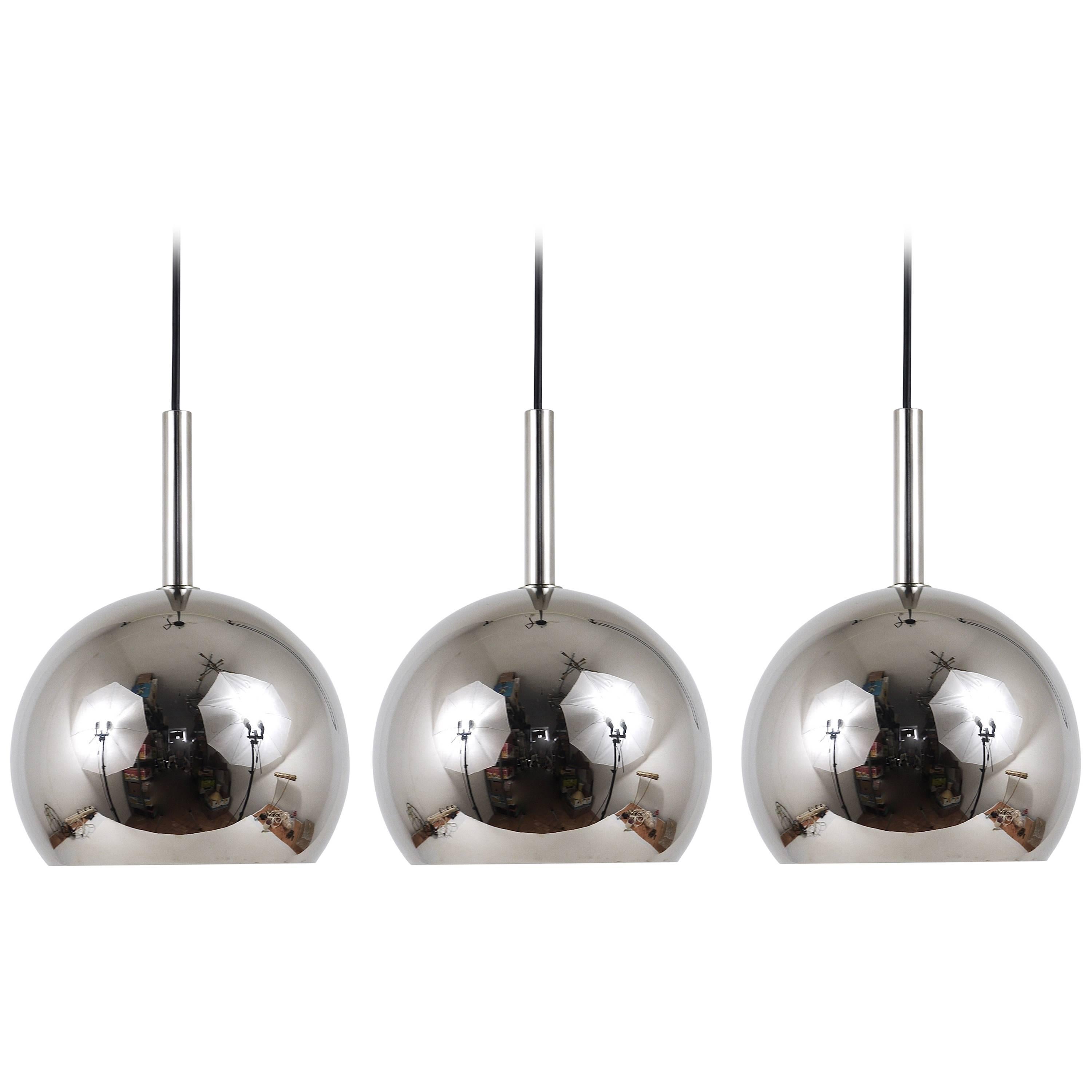 Up to three beautiful chrome-plated metal Space Age globe ceiling lights. Manufactured by Hoffmeister Germany in the 1970s. In very good condition. Three lamps are available, can be sold separately, the price is per piece. The globes have a diameter