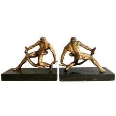 Paire de serre-livres sculpturaux masculins musclés en vermeil